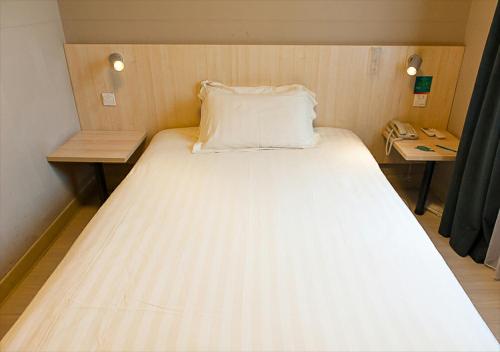 Imagen de la habitación del Hotel Jinjiang Inn Beijing Zhushikou. Foto 6