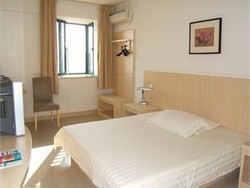 Imagen de la habitación del Hotel Jinjiang Inn Central Qingdao Hangzhou Road. Foto 4