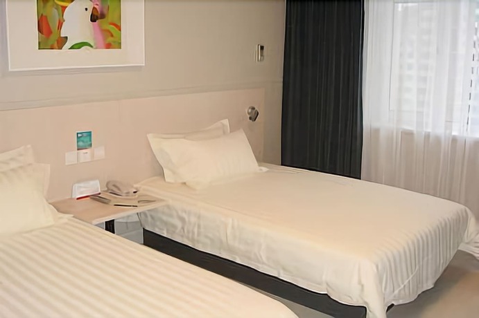 Imagen de la habitación del Hotel Jinjiang Inn Changchun Renmin Square. Foto 14