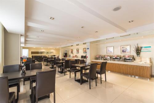 Imagen de la habitación del Hotel Jinjiang Inn Guangzhou Sanyuanli Street Heyi Street. Foto 9