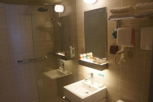 Imagen de la habitación del Hotel Jinjiang Inn Haikou Guomao Jinlong Road. Foto 6
