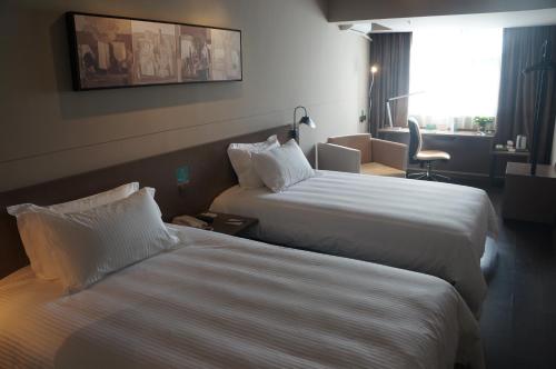 Imagen general del Hotel Jinjiang Inn Haikou Guomao Jinlong Road. Foto 4