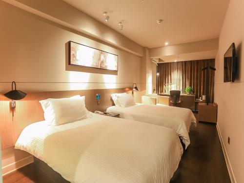 Imagen de la habitación del Hotel Jinjiang Inn Haikou Guomao Jinlong Road. Foto 9