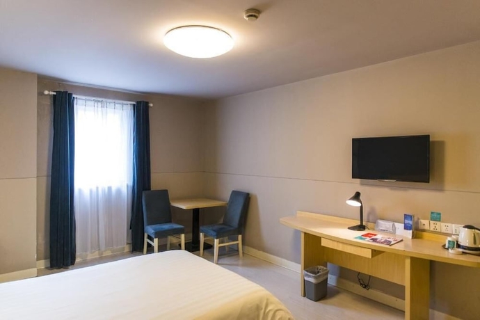 Imagen de la habitación del Hotel Jinjiang Inn Kunshan Train Station. Foto 11