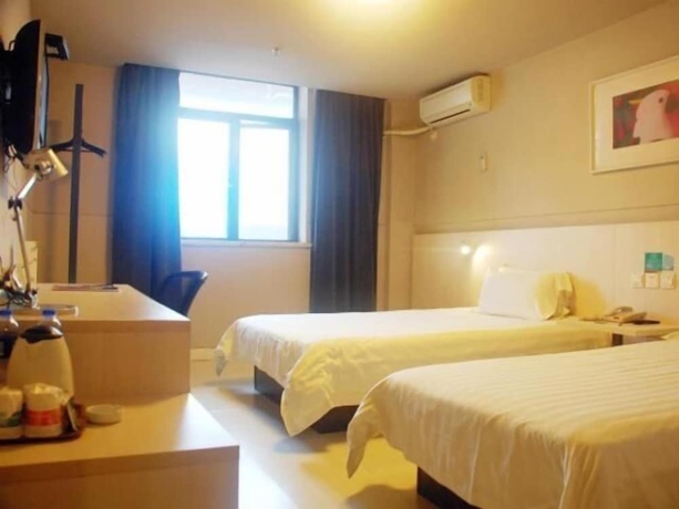 Imagen de la habitación del Hotel Jinjiang Inn Kunshan Train Station. Foto 16