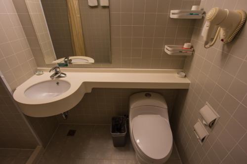 Imagen de la habitación del Hotel Jinjiang Inn Liuzhou Railway Station North. Foto 3