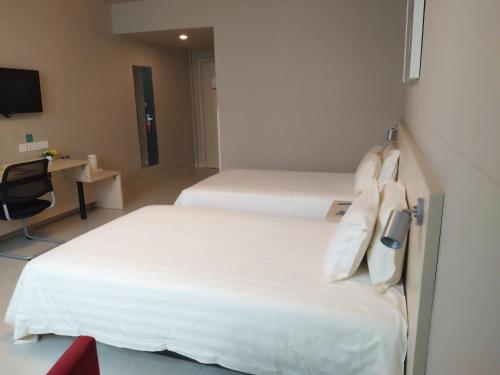 Imagen de la habitación del Hotel Jinjiang Inn Longyan Zhongshan Road Pedestrian Str. Foto 8