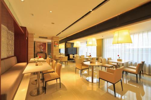 Imagen del bar/restaurante del Hotel Jinjiang Inn Longyan Zhongshan Road Pedestrian Str. Foto 3