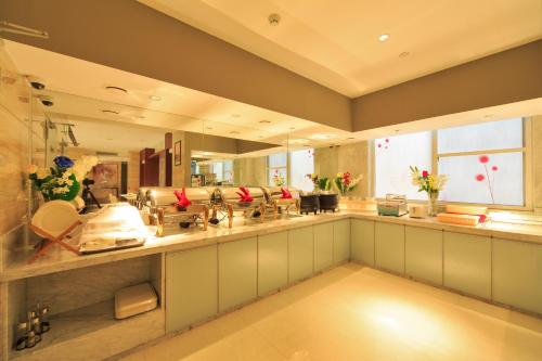 Imagen del bar/restaurante del Hotel Jinjiang Inn Longyan Zhongshan Road Pedestrian Str. Foto 4