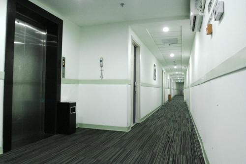 Imagen de la habitación del Hotel Jinjiang Inn Lvliang Changzhi Road. Foto 8