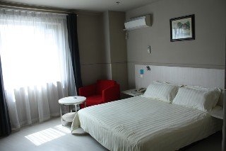 Imagen de la habitación del Hotel Jinjiang Inn Ningbo Tianyi. Foto 7