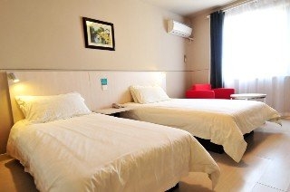Imagen de la habitación del Hotel Jinjiang Inn Ningbo Tianyi. Foto 9