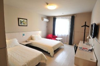 Imagen de la habitación del Hotel Jinjiang Inn Ningbo Tianyi. Foto 13