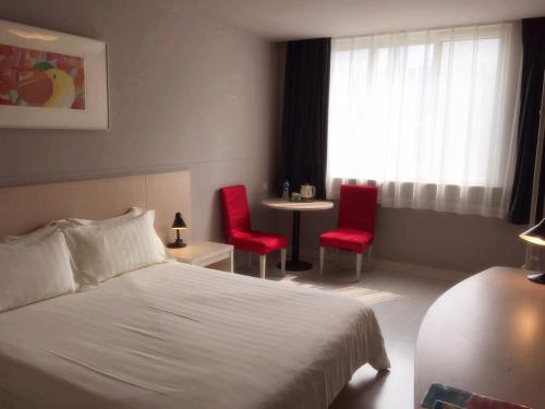 Imagen de la habitación del Hotel Jinjiang Inn Olympic Park. Foto 7