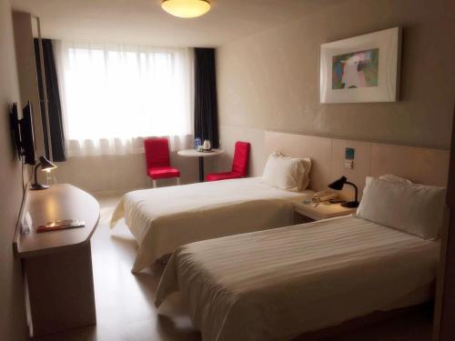 Imagen de la habitación del Hotel Jinjiang Inn Olympic Park. Foto 8