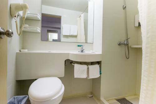 Imagen de la habitación del Hotel Jinjiang Inn Rizhao Haiqu Park. Foto 9