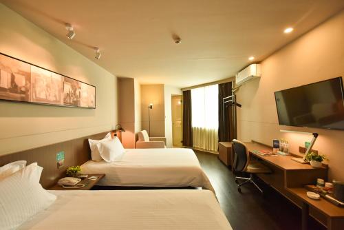 Imagen de la habitación del Hotel Jinjiang Inn Select Haikou Qilou Old Street Binhai Avenue. Foto 6