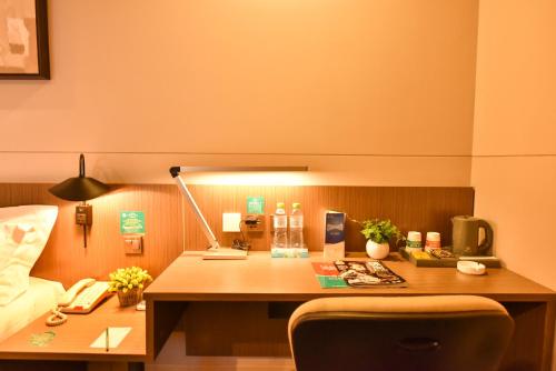 Imagen de la habitación del Hotel Jinjiang Inn Select Haikou Qilou Old Street Binhai Avenue. Foto 8