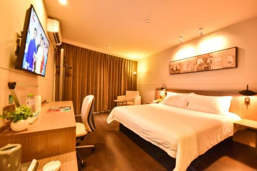 Imagen de la habitación del Hotel Jinjiang Inn Select Haikou Qilou Old Street Binhai Avenue. Foto 9