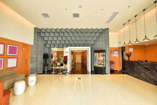 Imagen general del Hotel Jinjiang Inn Select Haikou Qilou Old Street Binhai Avenue. Foto 4