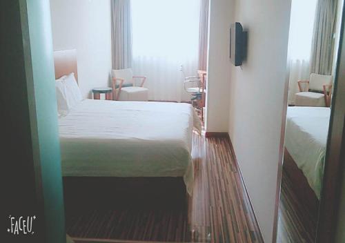 Imagen de la habitación del Hotel Jinjiang Inn Select Taiyuan South Inner Ringroll P. Foto 7