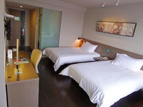 Imagen de la habitación del Hotel Jinjiang Inn Select Zhenjiang Middle Yangzi Road. Foto 6