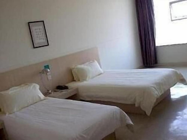 Imagen de la habitación del Hotel Jinjiang Inn Shanghai Baoyang Dock. Foto 4