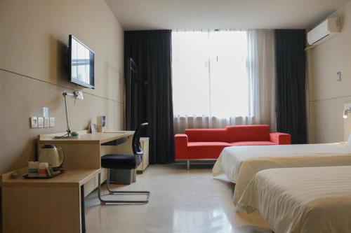 Imagen de la habitación del Hotel Jinjiang Inn Shanghai Chedun Studios. Foto 8
