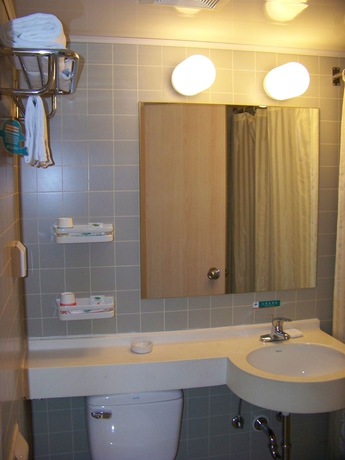 Imagen de la habitación del Hotel Jinjiang Inn Shenzhen Airport. Foto 3