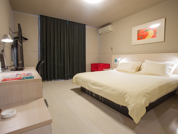 Imagen de la habitación del Hotel Jinjiang Inn Shenzhen Airport. Foto 13