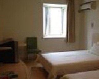 Imagen de la habitación del Hotel Jinjiang Inn Shijiazhuang Ping'an Street. Foto 8