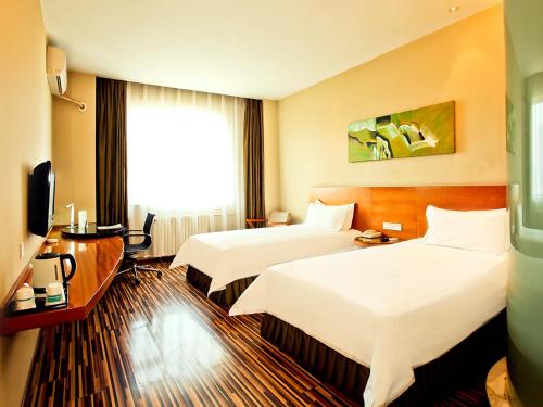 Imagen de la habitación del Hotel Jinjiang Inn Style Taiyuan Food Street Yangshi Street. Foto 6