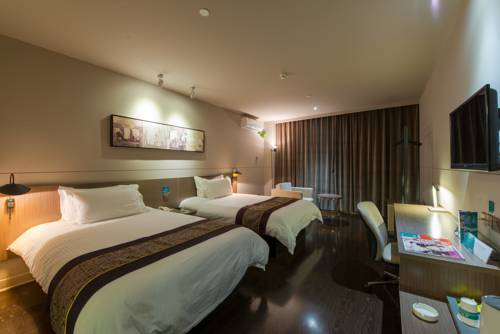 Imagen de la habitación del Hotel Jinjiang Inn Suzhou Sip Dushu Lake Dongxing Road. Foto 2