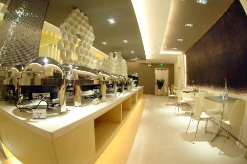 Imagen de la habitación del Hotel Jinjiang Inn Taiyuan Longtan Park. Foto 6
