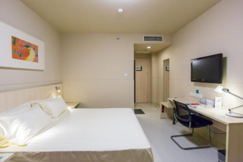 Imagen de la habitación del Hotel Jinjiang Inn Tianjin South Railway Station. Foto 4