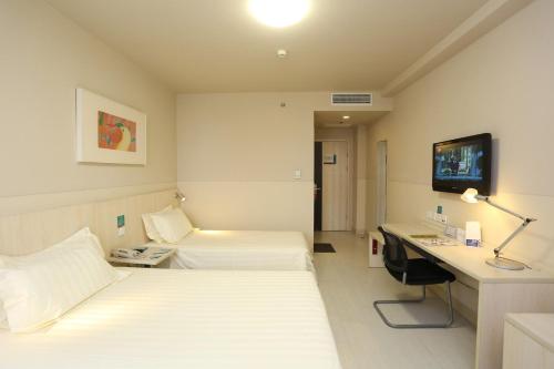 Imagen de la habitación del Hotel Jinjiang Inn Tianjin South Railway Station. Foto 8