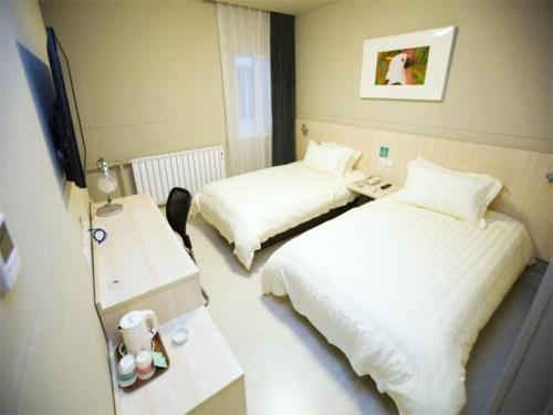 Imagen de la habitación del Hotel Jinjiang Inn Wuhai Joy City. Foto 7