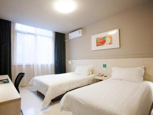 Imagen de la habitación del Hotel Jinjiang Inn Wuxi Central Station. Foto 9