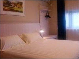 Imagen de la habitación del Hotel Jinjiang Inn Wuxi Wangzhuang Road E. Foto 10