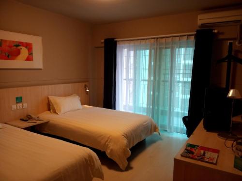 Imagen de la habitación del Hotel Jinjiang Inn Xiamen Exhibition Center. Foto 8
