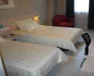 Imagen de la habitación del Hotel Jinjiang Inn Xiangzhou Lovers Road C. Foto 7