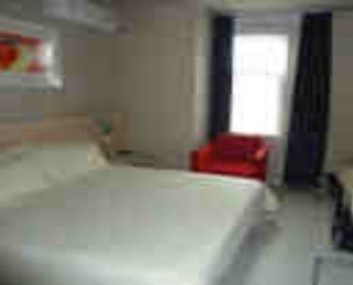 Imagen de la habitación del Hotel Jinjiang Inn Xiangzhou Lovers Road C. Foto 9