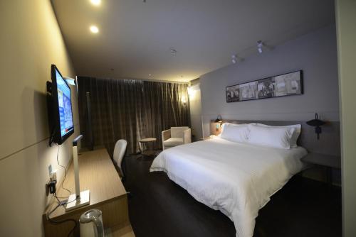 Imagen de la habitación del Hotel Jinjiang Inn Yancheng Dongtai Municipal Government. Foto 7