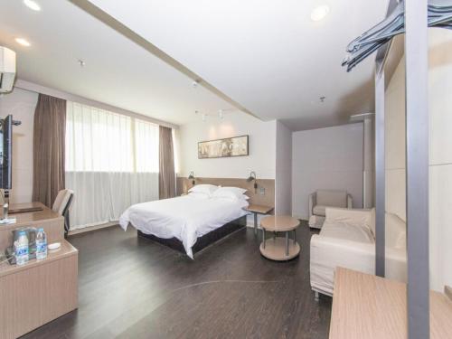 Imagen de la habitación del Hotel Jinjiang Inn Yangzhou Slender West Lake Dongguan Street. Foto 18