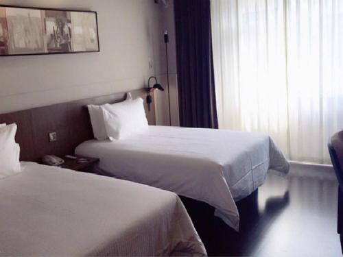 Imagen de la habitación del Hotel Jinjiang Inn Yangzhou Slender West Lake Dongguan Street. Foto 19