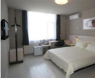 Imagen de la habitación del Hotel Jinjiang Inn Yantai International Exhibition Center. Foto 8