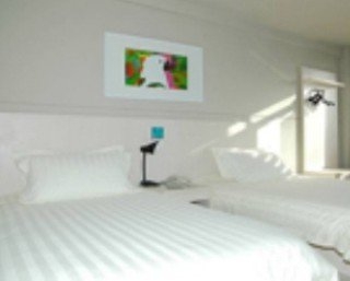 Imagen de la habitación del Hotel Jinjiang Inn Yantai International Exhibition Center. Foto 9