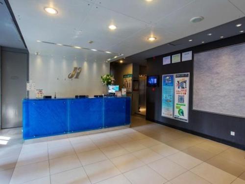 Imagen de la habitación del Hotel Jinjiang Inn Yueyang Railway Station. Foto 9