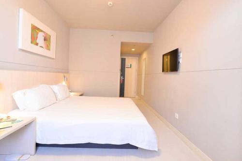 Imagen de la habitación del Hotel Jinjiang Inn Zhuhai Gongbei Fuhuali. Foto 2