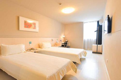 Imagen de la habitación del Hotel Jinjiang Inn Zhuhai Gongbei Fuhuali. Foto 3